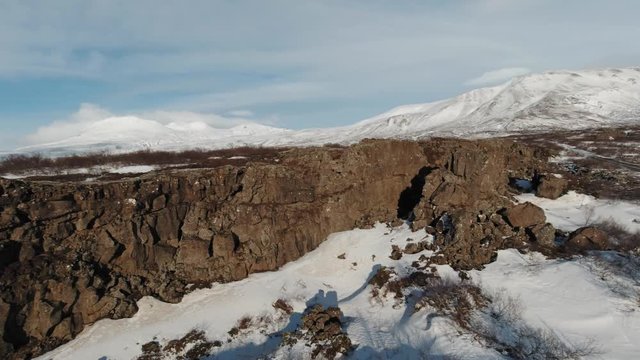 Beautiful Iceland Rock Formation Coated With Thin Melting Ice Between Cracks In Rocks- Drone (fpv)