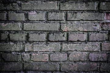 Background of old vintage dirty brick wall with peeling plaster, texture
