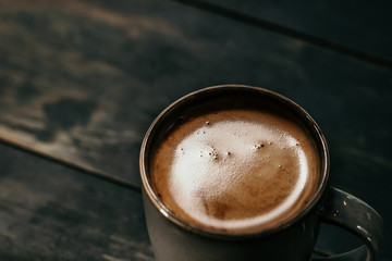 A cup of americano coffee close up photo 