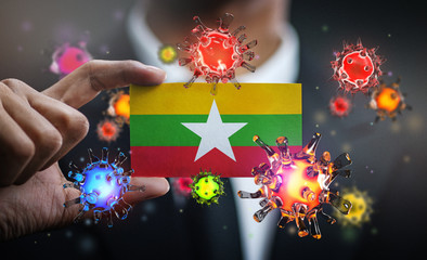 Corona Virus Around Myanmar Flag. Concept Pandemic Outbreak in Country