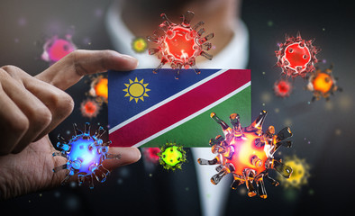 Corona Virus Around Namibia Flag. Concept Pandemic Outbreak in Country