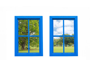 Vintage modern blue windows frame with space, garden view looking out from house.