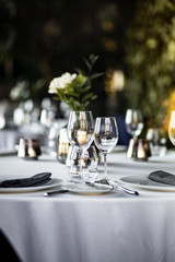 Beautiful table set for an event party or wedding reception . restaurant interior	