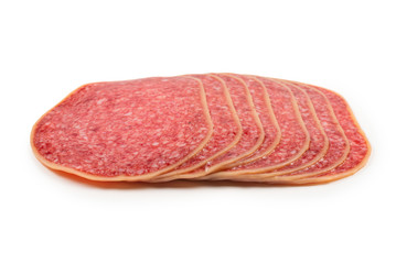 Salami slices isolated on white background.