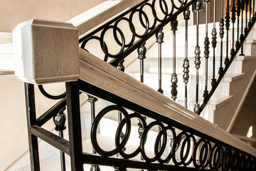Classic wooden stairs in a stylish house. Knots for connecting stair parts