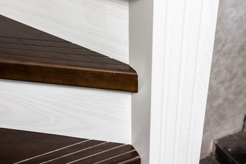 Classic wooden stairs in a stylish house. Knots for connecting stair parts