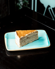 creamy dessert topped in blue plate