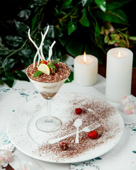 dessert served in glass with fruits on top