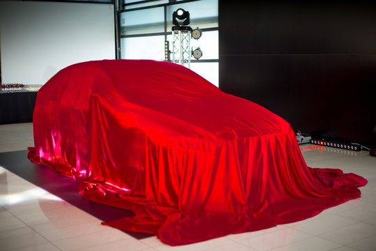 Car Covered With Red Cloth, Car Presentation