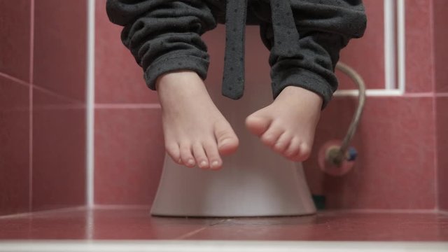 Kid in the toilet.