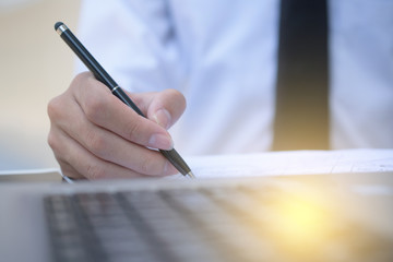 Man sign or write on document business