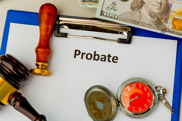 Probate sign, stack of papers and gavel.