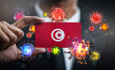 Corona Virus Around Tunisia Flag. Concept Pandemic Outbreak in Country