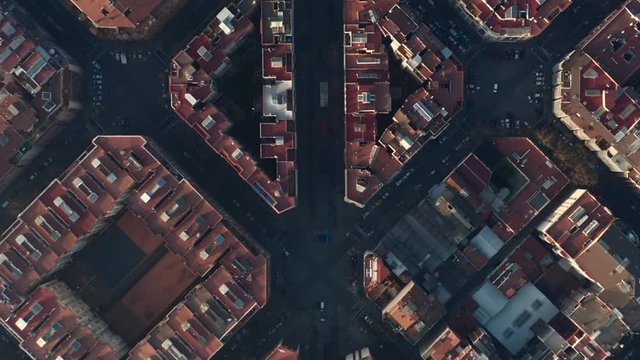 AERIAL: Barcelona Overhead Drone Shot of Typical City Blocks in Beautiful Sunlight with Urban Traffic 