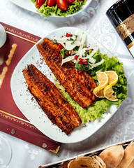 fried fish fillet with lemon slices