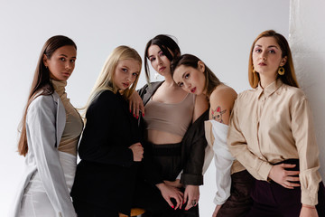 Obraz na płótnie Canvas Five women on white background