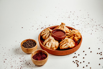 fried khinkali with pepper and adjika