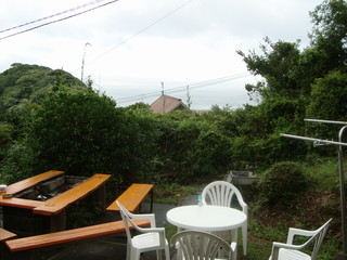 Photo of garden tables and chairs. Barbecue from now on.