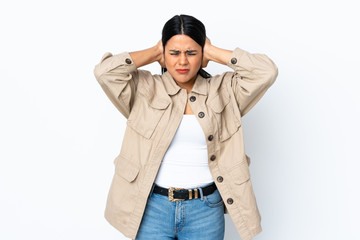 Young latin woman woman isolated on white background frustrated and covering ears