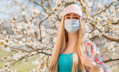 Young woman in protect mask, anti alergy, stop virus, save yourself