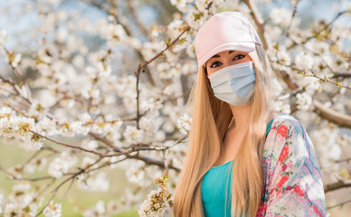 Young woman in protect mask, anti alergy, stop virus, save yourself