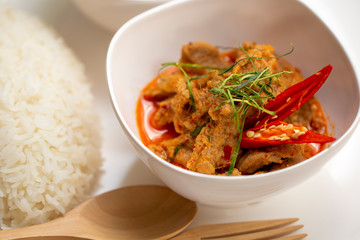 The Siam cuisine concept : classic Thai daily menu is curry panang pork with jasmine rice 