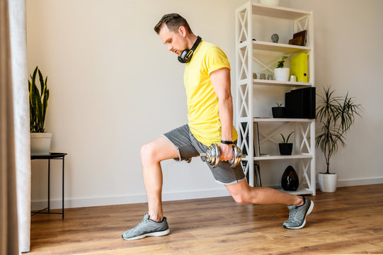 Young Active Guy Doing Lower Body Workout At Home