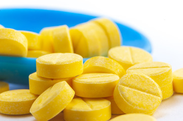 Macro close up shot of medicine-tablets on white background for health care concepts.