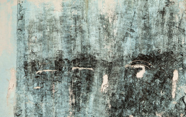 Cyan and black weathered painted wall background. Abstract textured blue backdrop with stains and cracks