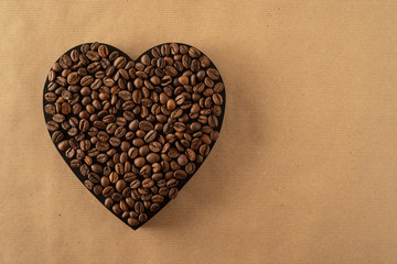 Coffee beans on a black heart