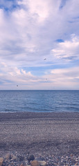 A rocky beach on the Black Sea in Batumi, Georgia. Quiet and empty background.