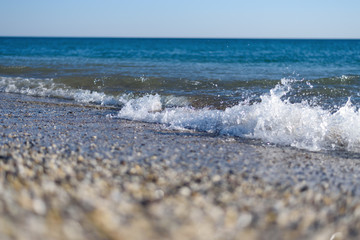 Beautiful wave in the sea at sunny day.