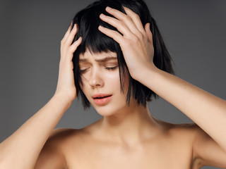 Fototapeta premium young woman with headache
