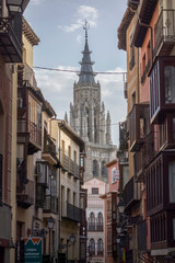 Fototapeta na wymiar Toledo, Spain, 5,7,2015: streets of Toledo with the cathedral in the background