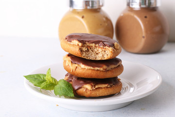  Honey cookies with peanut butter and coated with chocolate, close up, horizontal