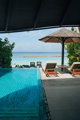 Tranquil Beach resort, bungalow with private endless pool, on tropical Maldives island, summer vacation