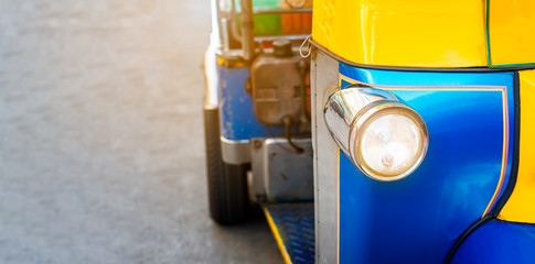 Background of colorful blue yellow tuk tuk traditional local taxi car for tourist with copy space....