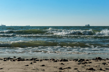 Fototapeta na wymiar Sea coast. Tides and storms at sea. Waves on the Baltic Sea. Deserted seashore.