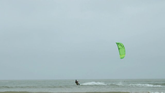 Kite Board Surfing on Gulf of Mexico at Port Aransas Texas on a foggy day