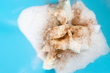 White sugar with grated cocoa preparing for cookies.