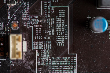 A fragment of the electronic board of the video card. Photographed close-up.