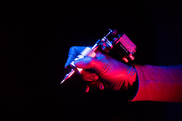 popular tattoo machine female hands permanent dark background