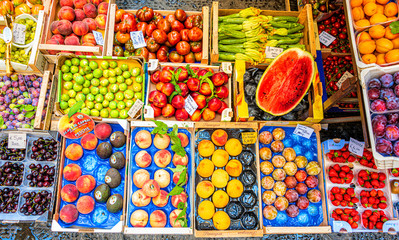 fruits and vegetables shop along the road in florence, italy