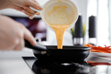 Beaten Eggs Pour in the Pan. Omelet Mix, Future Breakfast