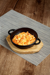 omelette in black pan