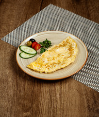 omelette with sliced vegetables