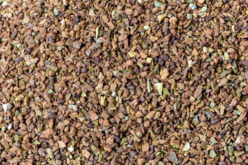 Crushed stone abstract textured background. The rough texture of the stone. Building material background