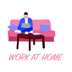 Work at home. Home Office. A man sits on a sofa and works on a laptop from home. Self isolation. Quarantine.