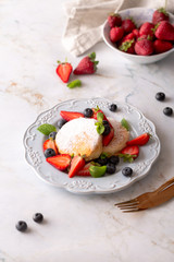 homemade fluffy pancakes for breakfast with berries