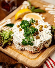 russian salad with beans on top